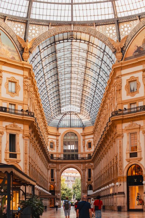 Free Explore the architectural beauty of Galleria Vittorio Emanuele II, Milan's iconic shopping gallery. Stock Photo
