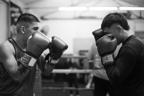 Free Two boxers face off during a training session in a Buenos Aires gym, showcasing skill and focus. Stock Photo