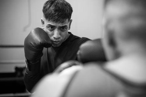 Free Focused boxer practicing punches during a training session in Buenos Aires gym. Stock Photo