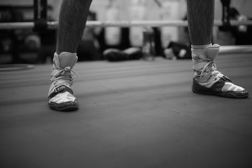 Free Monochrome image of boxing shoes on a ring in a Buenos Aires gym. Stock Photo