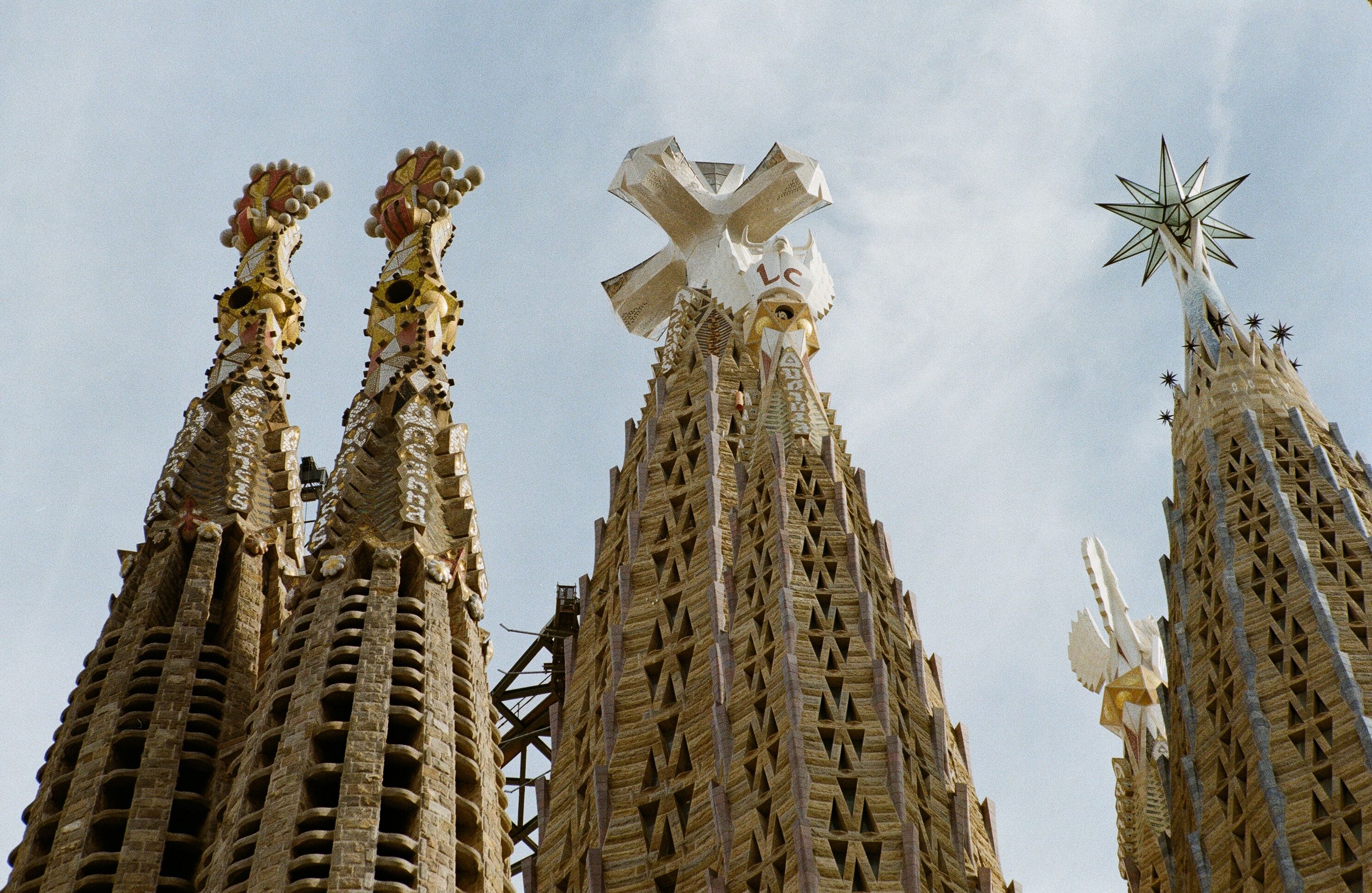 Close-up of the intricate towers of Sagrada Familia in Barcelona, Spain.