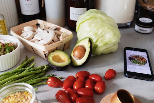 Ingredients for cooking dinner near smartphone