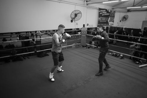 Free Two boxers sparring in a gym in Argentina, showcasing intense training atmosphere. Stock Photo