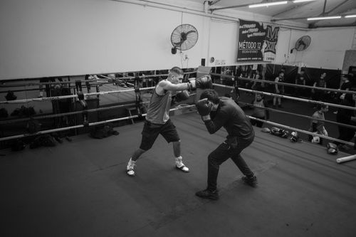 Free Two boxers sparring in an indoor boxing gym in Argentina, showcasing intense training. Stock Photo