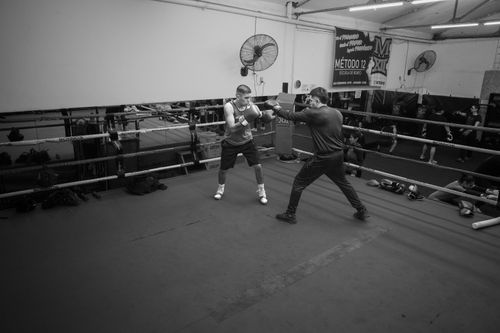 Free Intense boxing coach session in an Argentine gym, with a focus on training techniques. Stock Photo