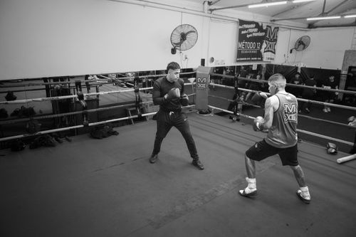 Free Two men sparring in a boxing ring at a gym in Argentina. Stock Photo
