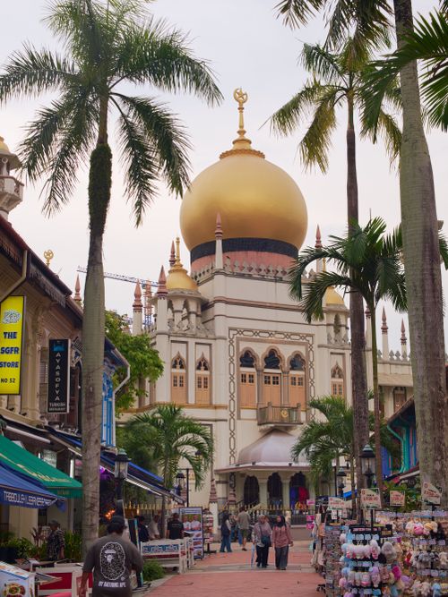 Free Vibrant scene of Sultan Mosque, Singapore with lively street life. Stock Photo