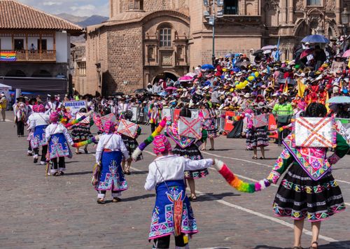 Free Colorful traditional parade with dancers in Cusco, Peru, showcasing vibrant cultural attire. Stock Photo