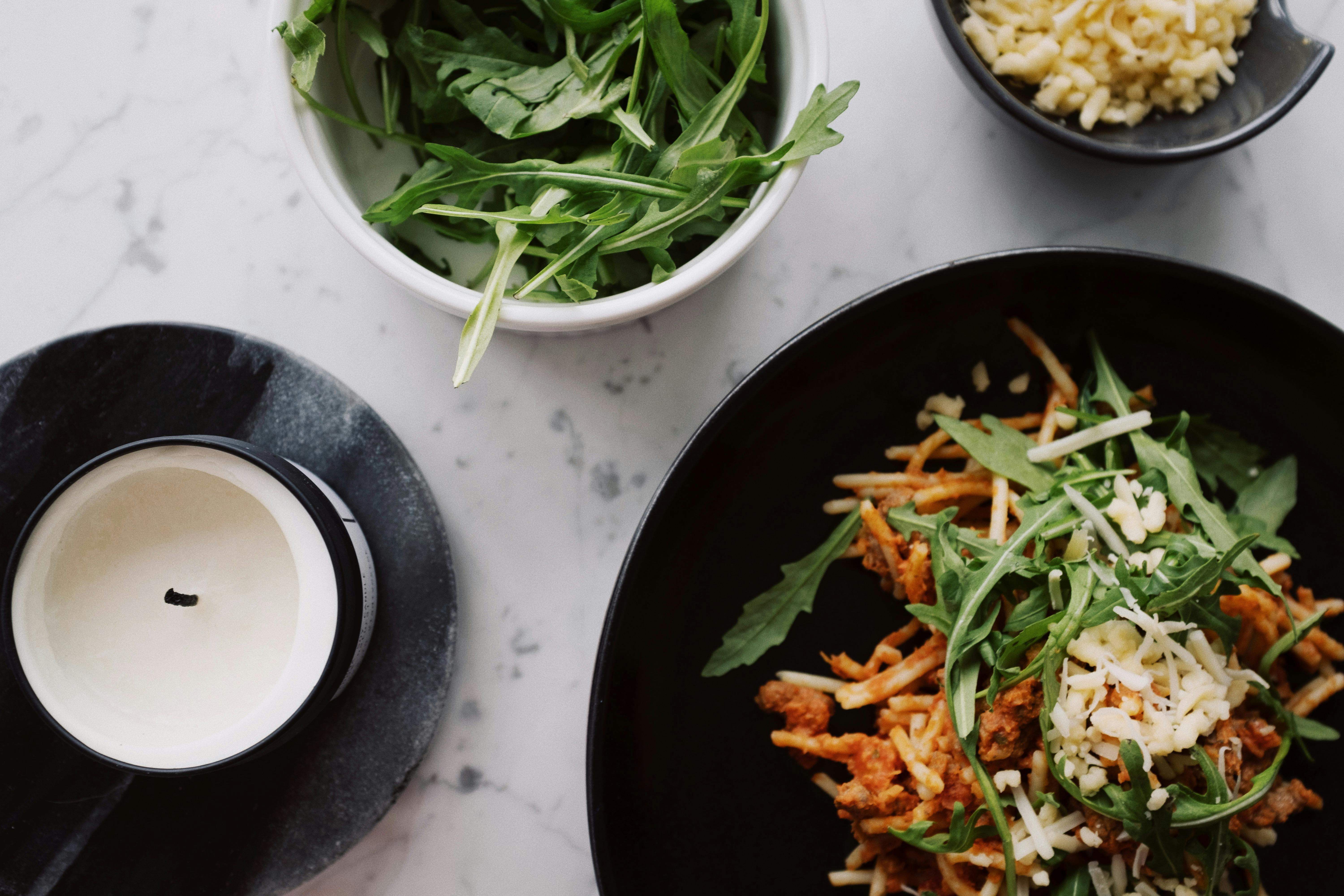 Yummy pasta and bowls with additives · Free Stock Photo