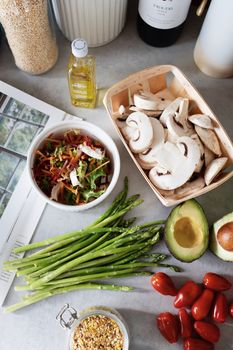 A colorful assortment of fresh vegetables and ingredients for a delicious salad.