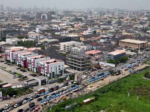 Free Vibrant Lagos cityscape showcasing dense urban development and traffic. Stock Photo