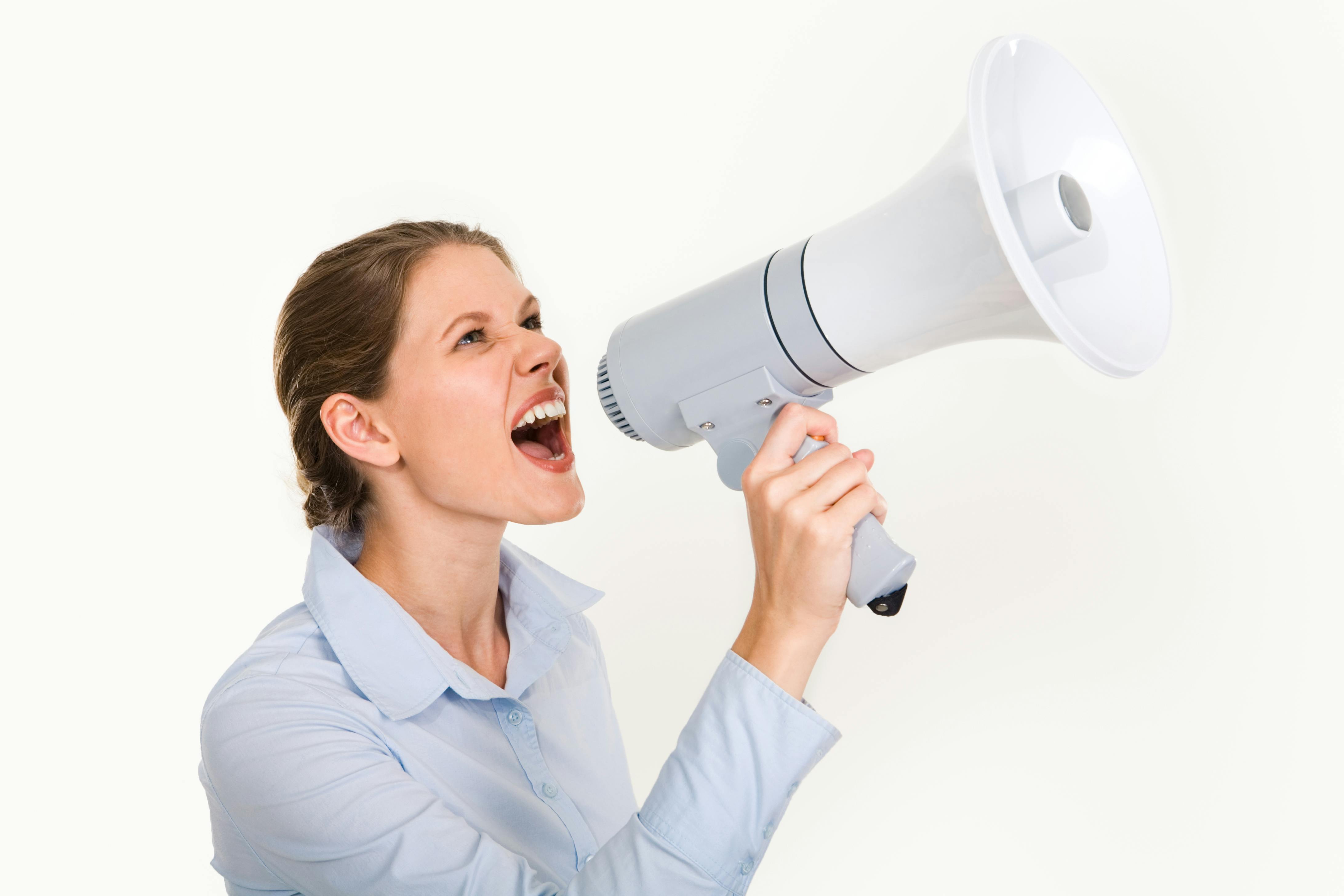 Free Young Woman With a Megaphone Stock Photo
