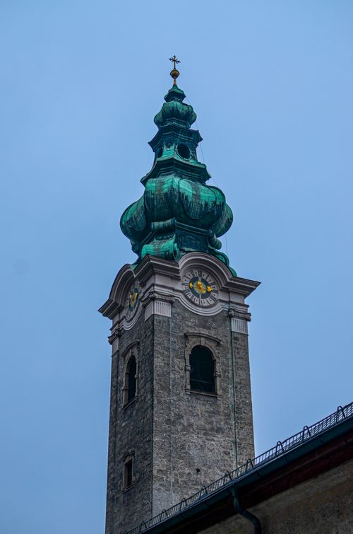Free Close-up view of a historic clock tower with copper dome in Salzburg, Austria. Stock Photo