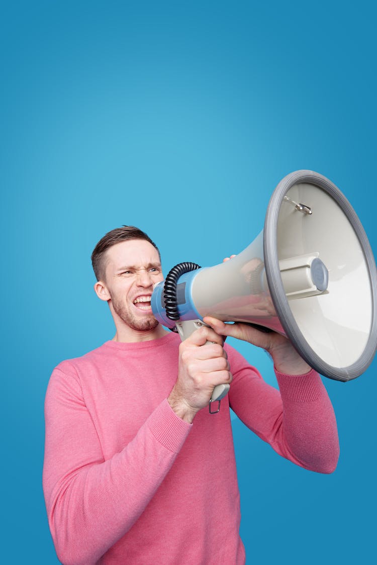 Man Talking On A Megaphone