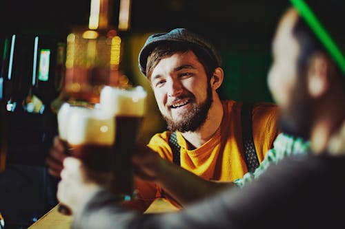 Free Friends at a Bar Cheering Stock Photo