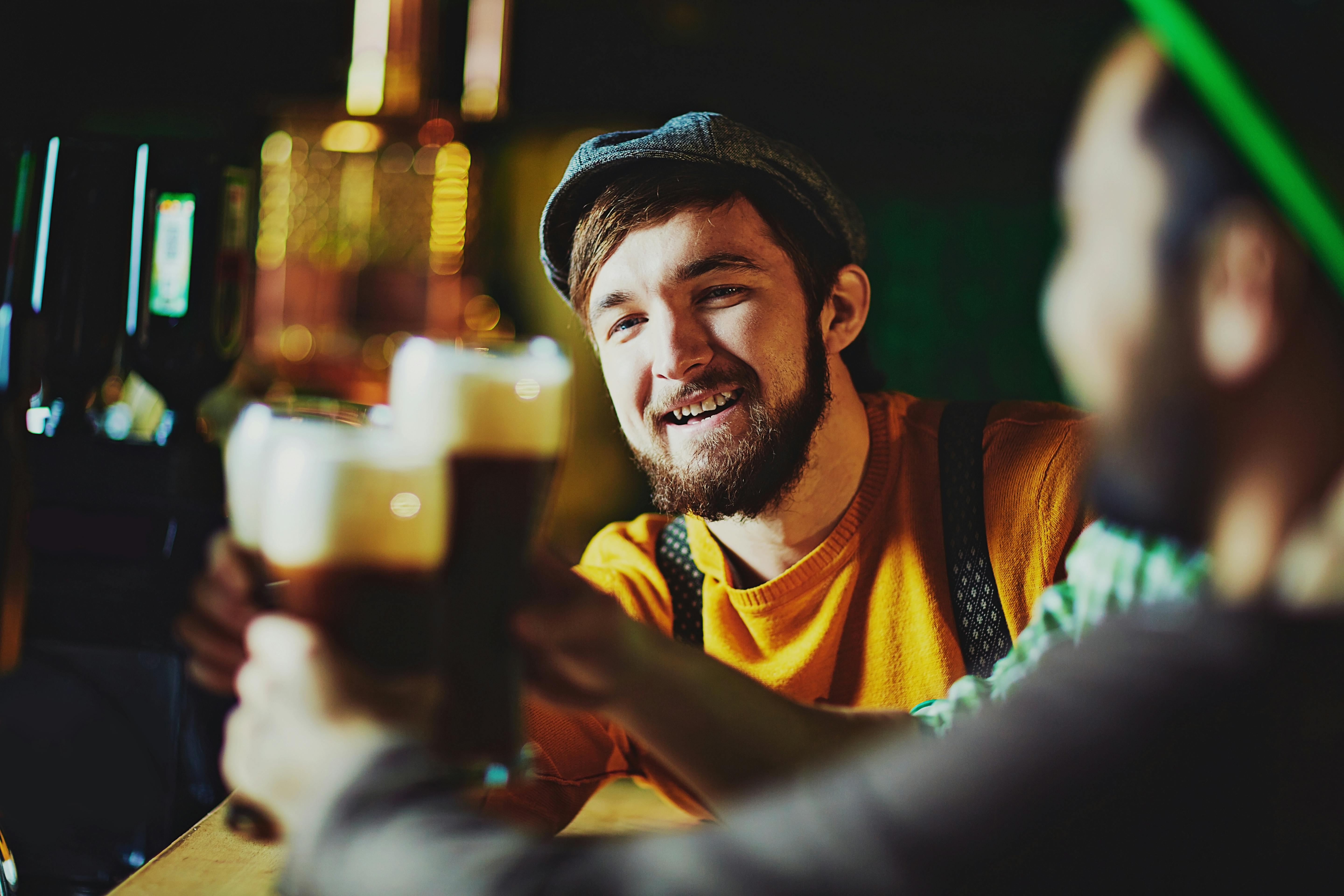 friends-at-a-bar-cheering-free-stock-photo