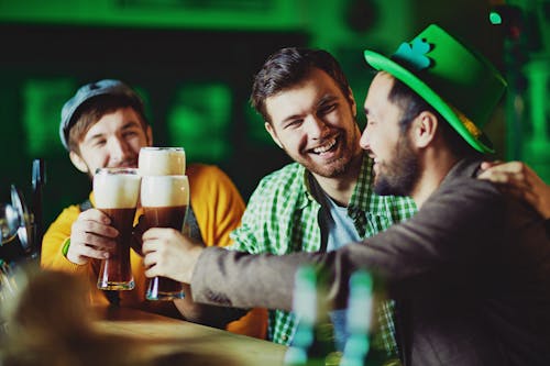 Man In Green And White Plaid Dress Shirt Holding Drinking Glass