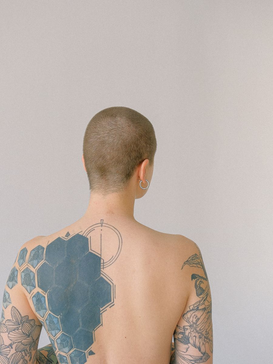 A full blackwork back bodysuit in progress.