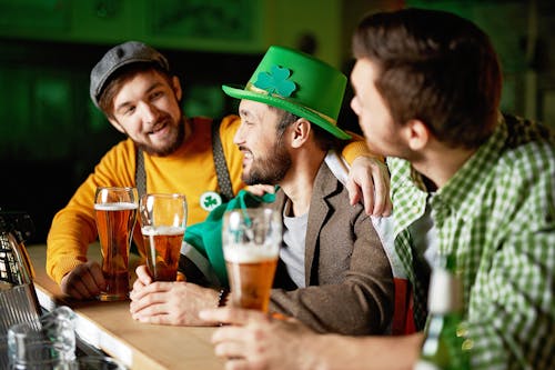 Men Talking at a Bar