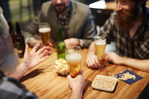 Men Talking at a Bar