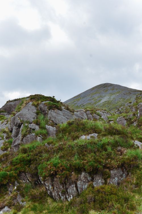 Free Stunning view of rocky mountainside in Ireland with cloudy sky. Stock Photo