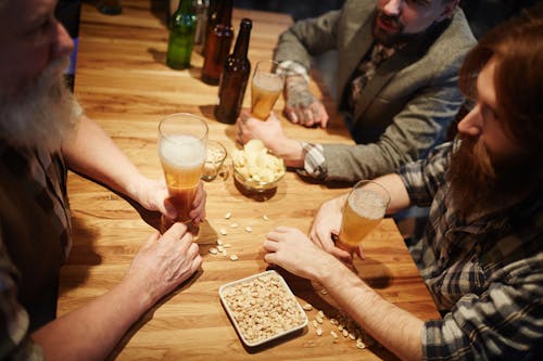 Free Men With Beer at a Bar Stock Photo