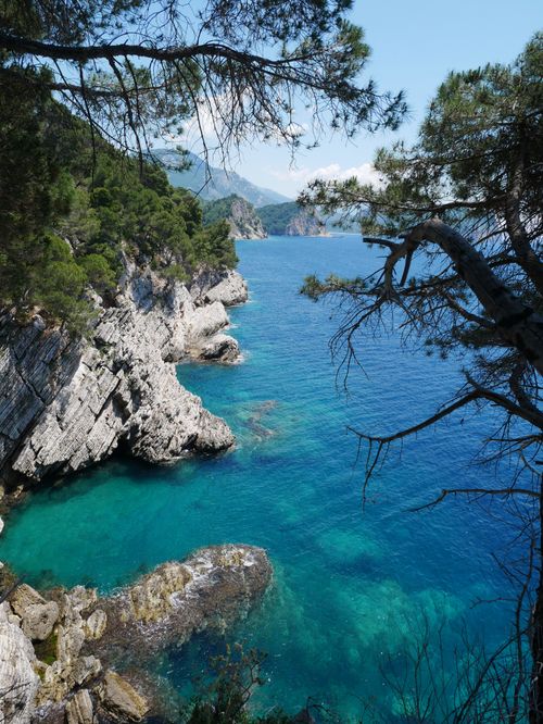 Free Breathtaking view of rugged cliffs and turquoise sea on the Montenegro coastline. Stock Photo