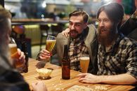 Men Talking at a Bar