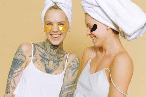 Free Laughing women in eye patches on face Stock Photo