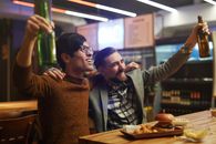 Men Celebrating at a Bar
