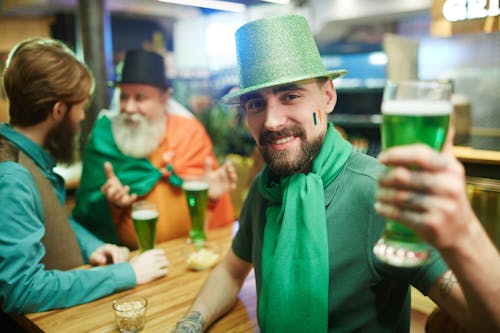 Man With Green Beer in Hand