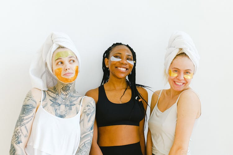 Cheerful Women With Masks On Face