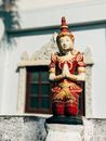 Gold and Red Hindu Deity Statue