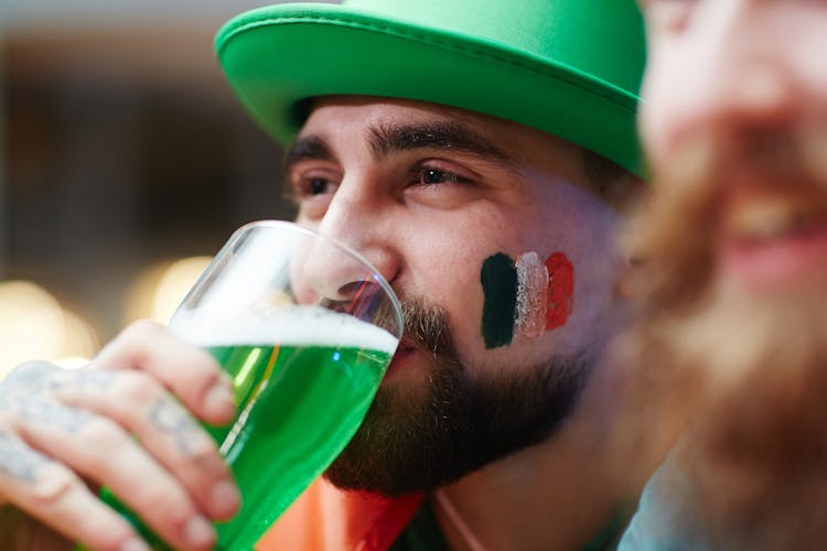 Man Drinking Green Beer