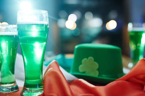 Free Drinking Glass With Green Liquid Inside Stock Photo