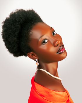 Stunning portrait of a woman in a red dress with pearl necklace.