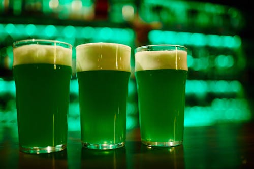 3 Clear Drinking Glasses With Green Beer