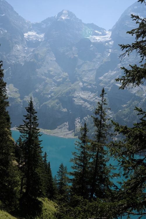 Free Breathtaking mountain and lake view at Oeschinensee, surrounded by lush greenery. Stock Photo