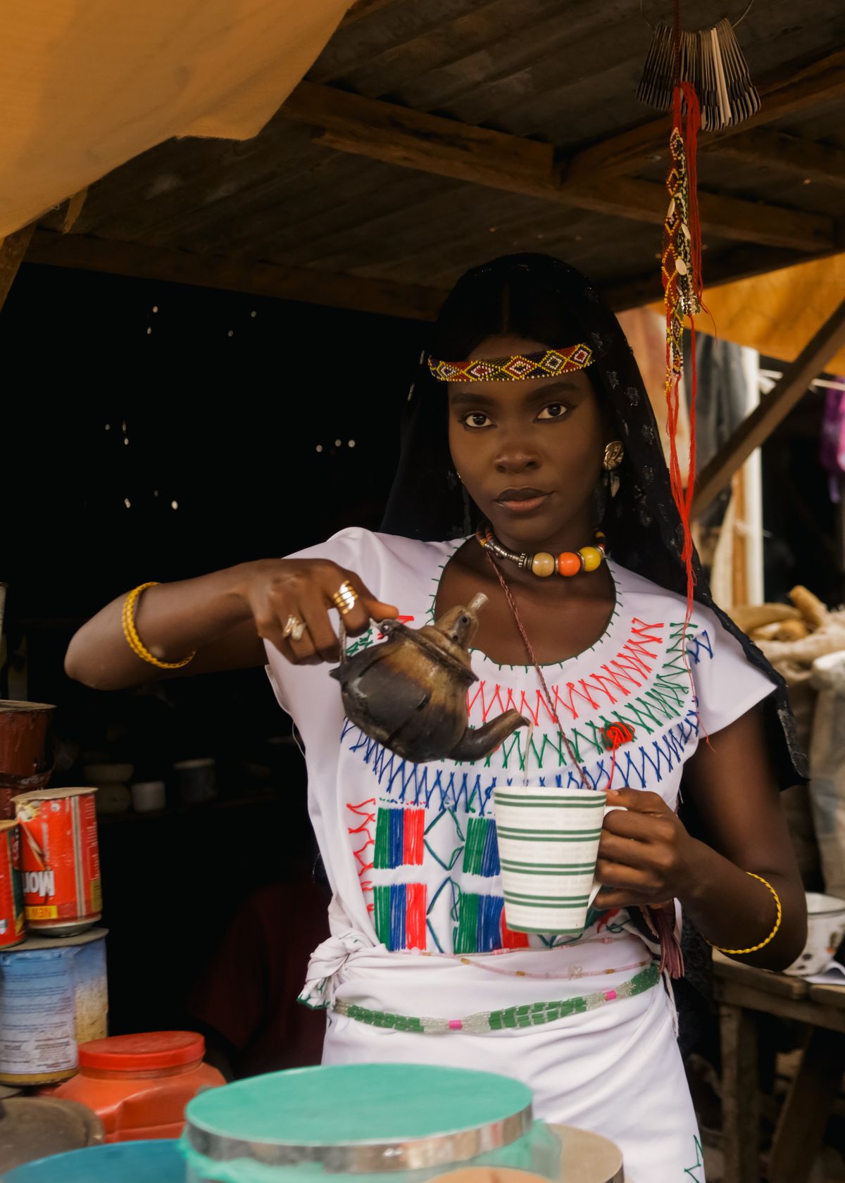 Ethiopian coffee ceremony with traditional clay pot