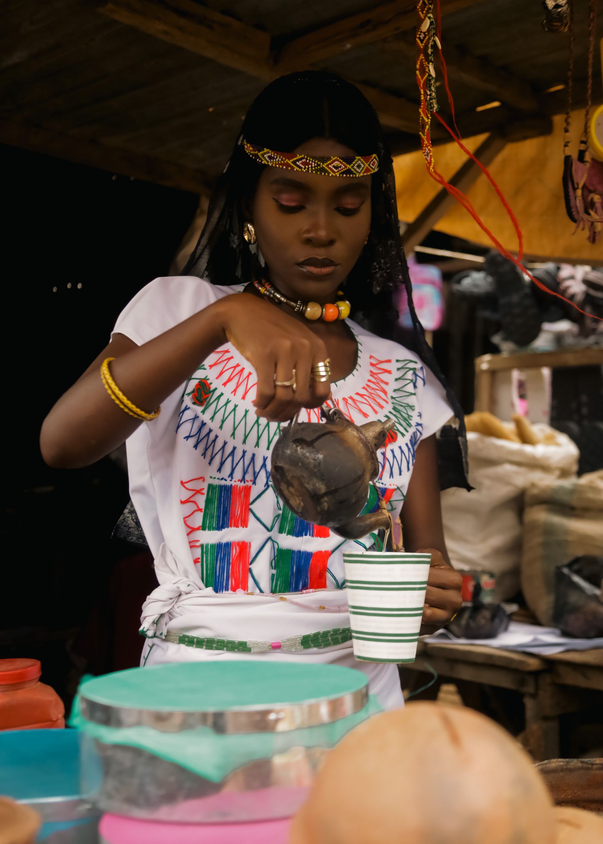 Ethiopian coffee ceremony with traditional clay pot