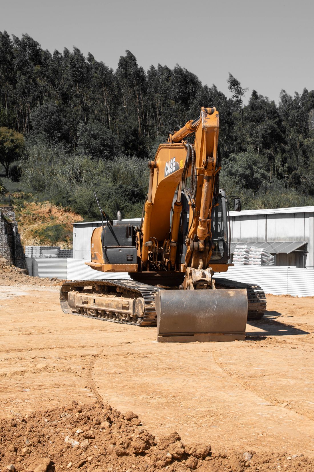 Heavy excavation equipment on a dirt job site
