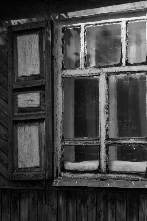 Free Black and white image of a vintage wooden window with shutter. Stock Photo