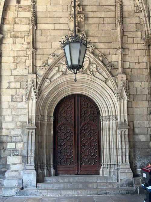Free Intricately designed Gothic entrance of a historic building in Barcelona, Spain. Stock Photo