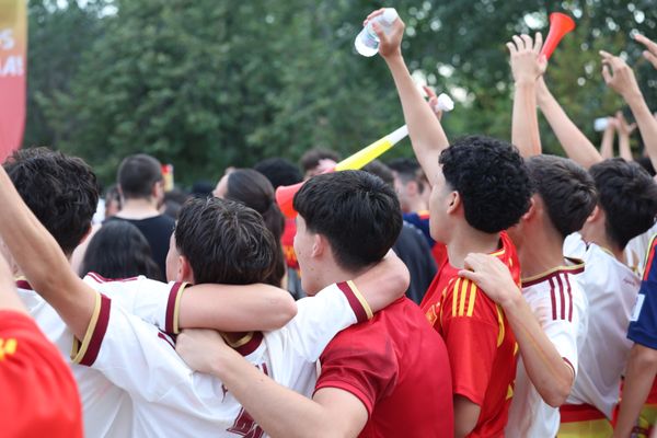 Fans celebrating after a win in Madrid