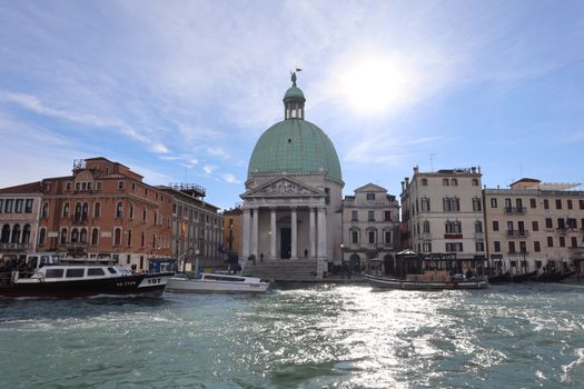 Iconic Chiesa di San Simeon Piccolo along the Grand Canal in Venice captured on a sunny day.