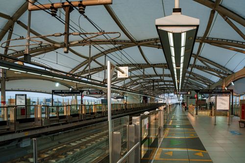 Free Wide-angle view of a modern train station in Jakarta, Indonesia, showcasing sleek architecture. Stock Photo