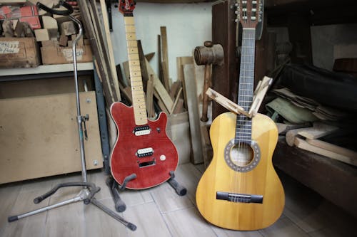 Handmade guitars placed on floor