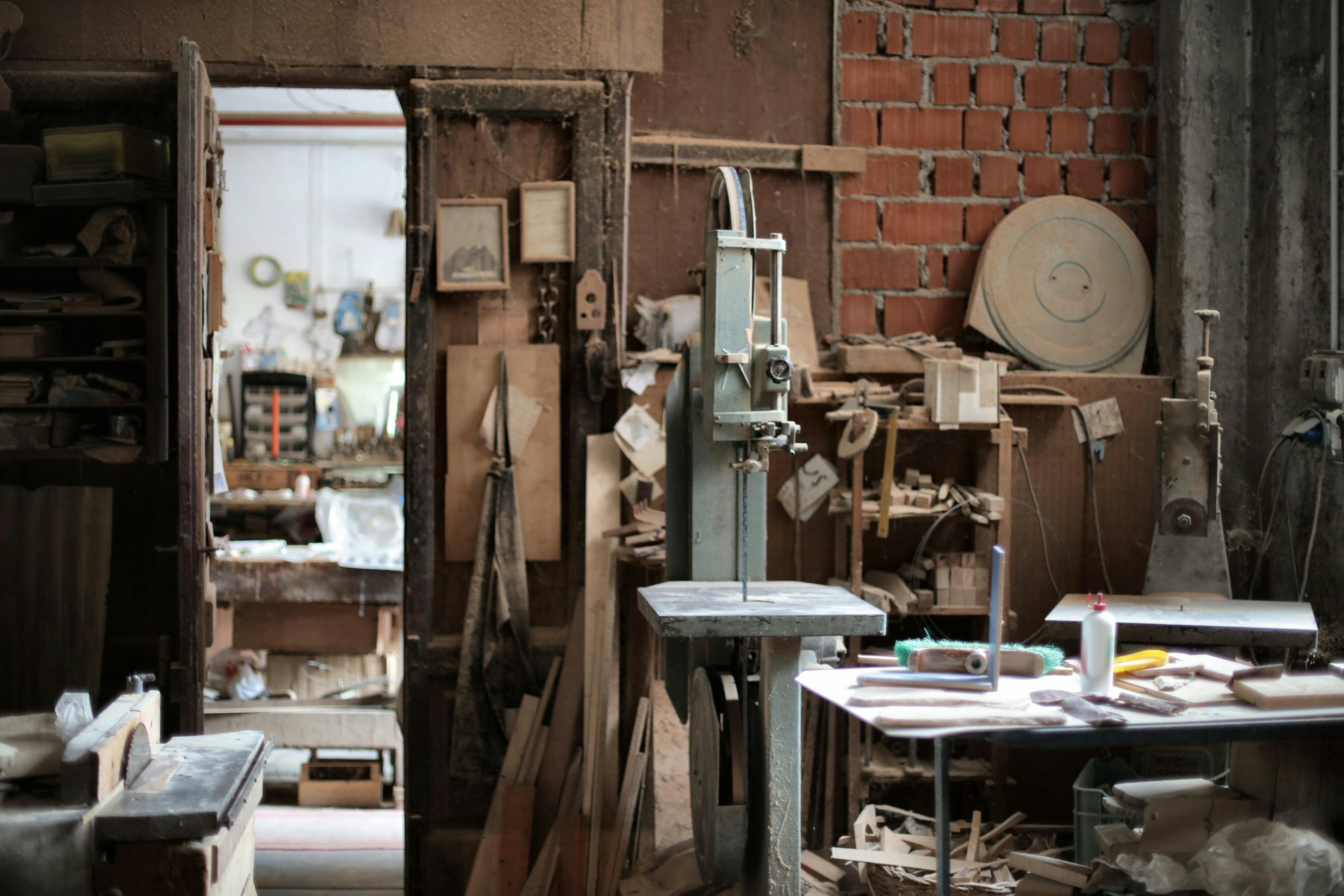Interior of messy old workshop · Free Stock Photo