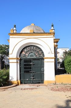 Charming historic chapel in Andalucía, capturing classic architecture under a clear blue sky.