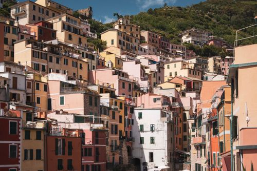 Free Vibrant Italian architecture in the hillside village of Liguria, showcasing colorful buildings and scenic views. Stock Photo